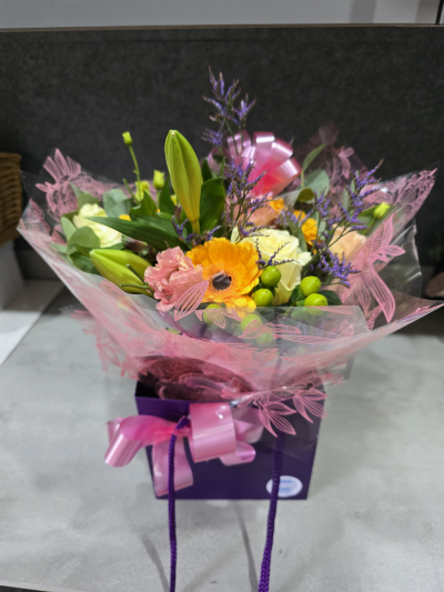 Flower bags - Flower bags , a lovely gift if your on a budget, these start at £28, choice of flowers and bags colours will vary depending on availability of stock.